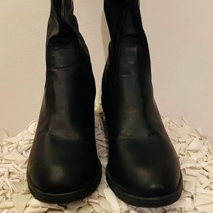 Women’s black thigh high boots